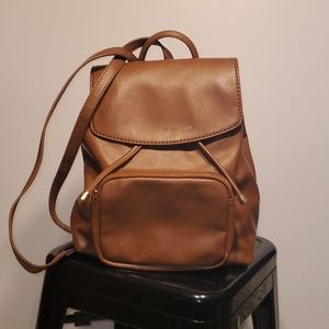 Tommy Hilfiger small backpack purse.